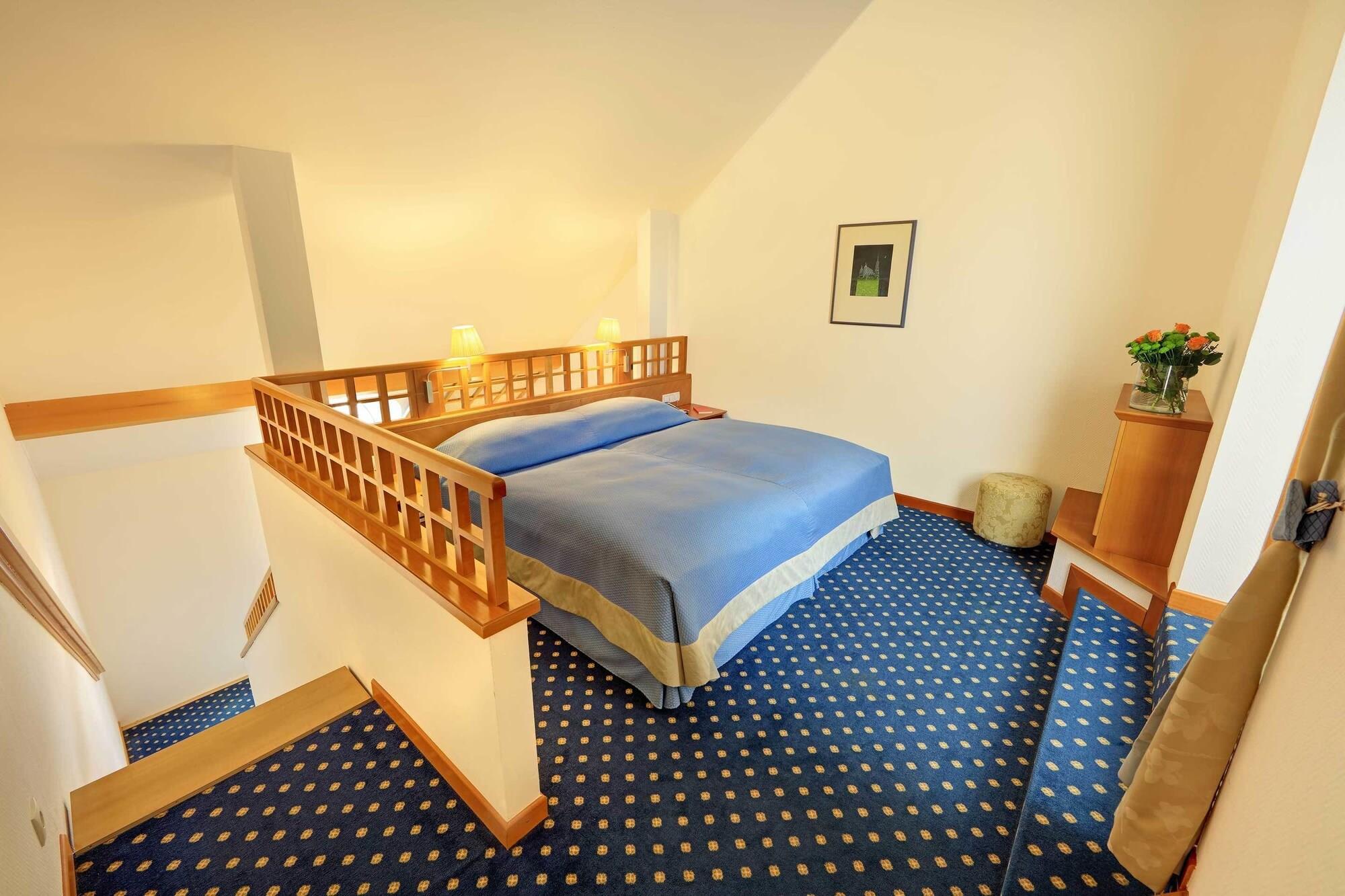 法国酒店 维也纳 外观 照片 A room at the hotel