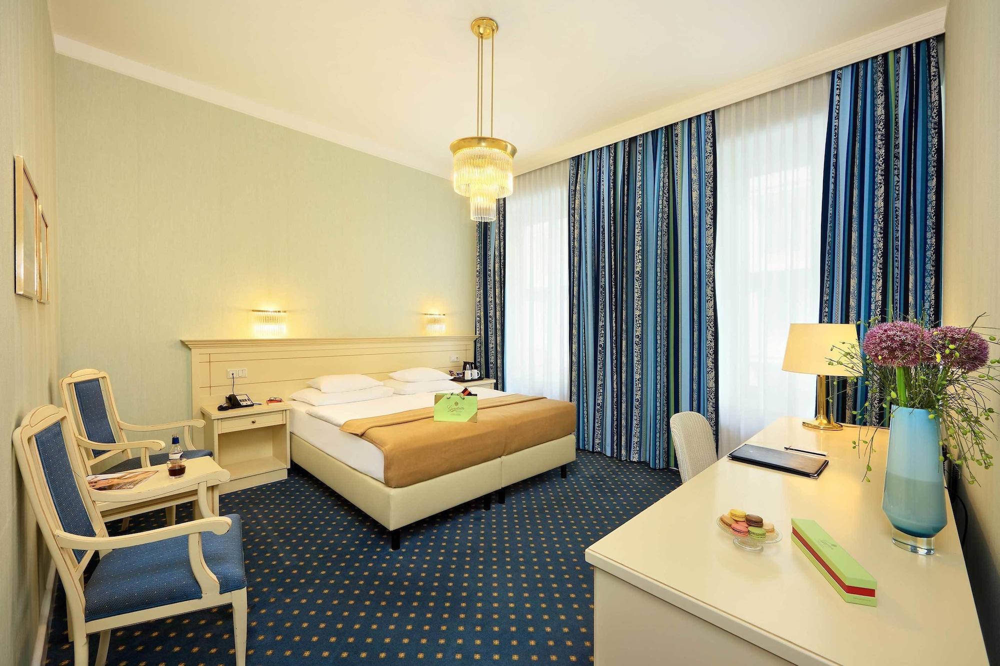 法国酒店 维也纳 外观 照片 A room at the hotel
